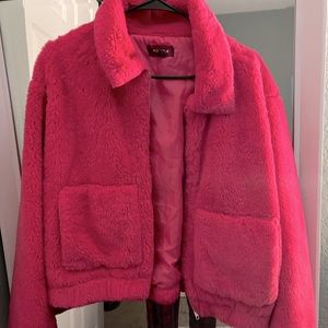 Hot pink furry jacket. Very stylish and warm !